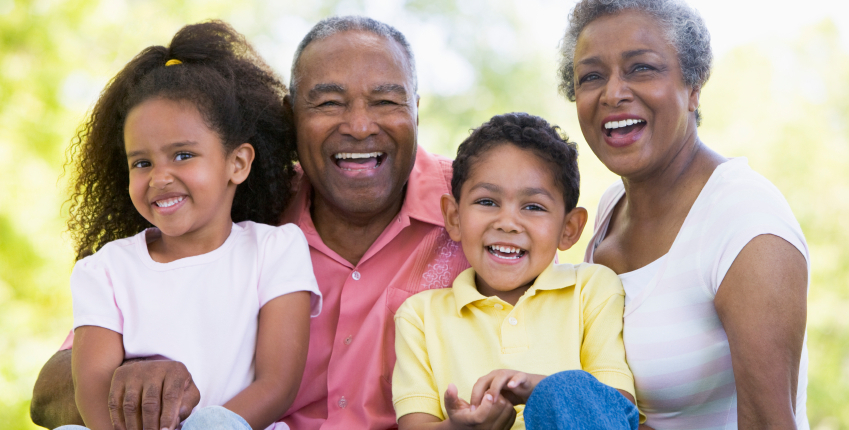 Grandparents laughing with grandchildren reverse mortgage canada